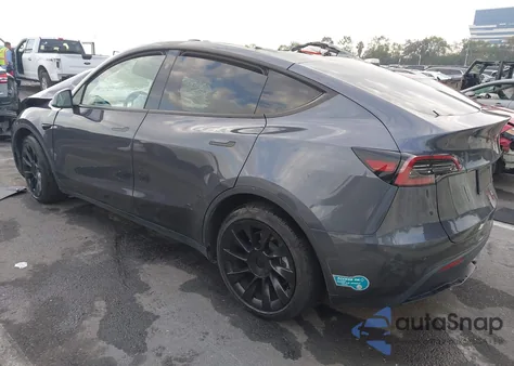 2023 Tesla Model Y Awd/Long Range Dual Motor All-Wheel Drive z USA, uszkodzony, nr VIN 7SAYGDEE9PF937549
